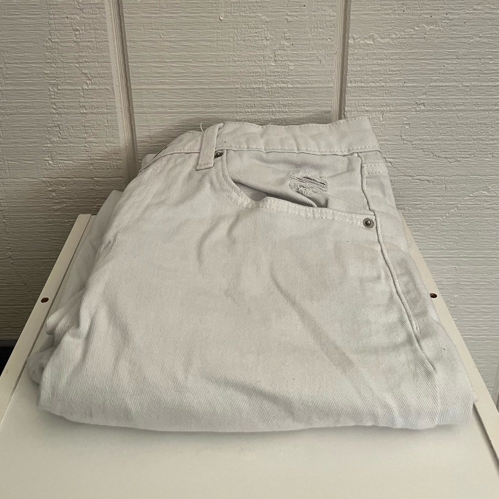 white oversized distressed jeans